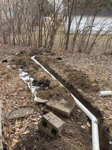 Discharge Line Installation for Proper Water Drainage