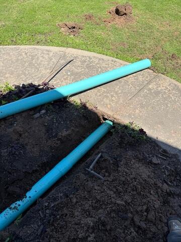 Trench Beneath Sidewalk