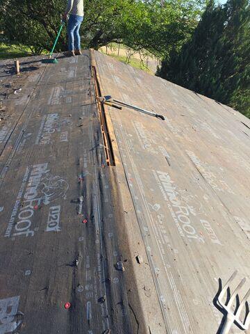 Removal of Rhino synthetic underlayment.