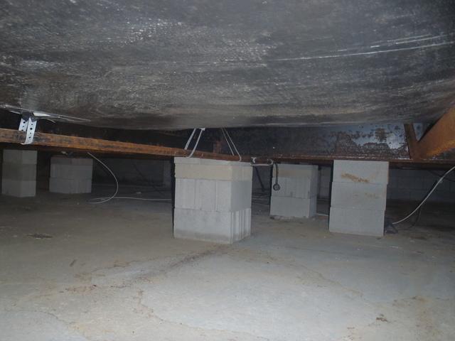 Radiant barriers are great tools for reflecting heat back into your conditioned space. Conditioned space is the part of your home you live in and pay to heat/cool. However, to be effective, barriers must be installed so air is able to move on both sides of the barrier. In this crawlspace, the radiant barrier was attached to the ceiling of a crawlspace with insulation between the barrier and the home. This allowed for no air movement on one side of the barrier. This is what caused the condensation to form on the underside of the barrier. Added moisture in your crawlspace causes wood rot, mold growth, attracts bugs and makes your home an allergy or asthma attack waiting to happen. If you have a radiant barrier installed like this in your crawlspace, Dr. Energy Saver will come out for free to give you an estimate of the possible damage caused and the most cost effective solution to get your home back into shape.