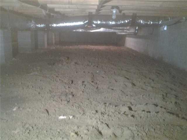 Dirt, Wet Crawl Space in Beachwood