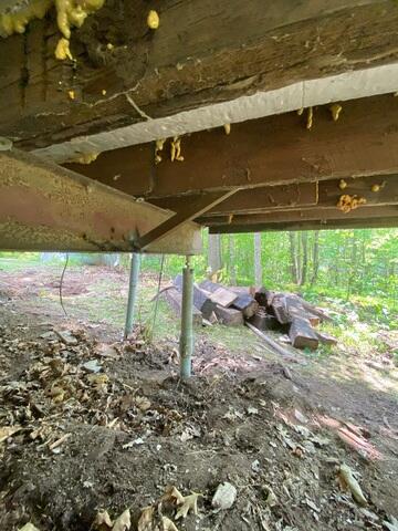After: New Helical Piers Supporting the Cabin