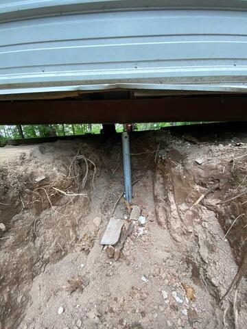 After: Helical Pier Securing Center Beam