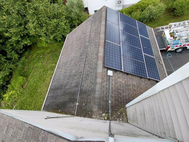 Roof and solar panels before cleaning