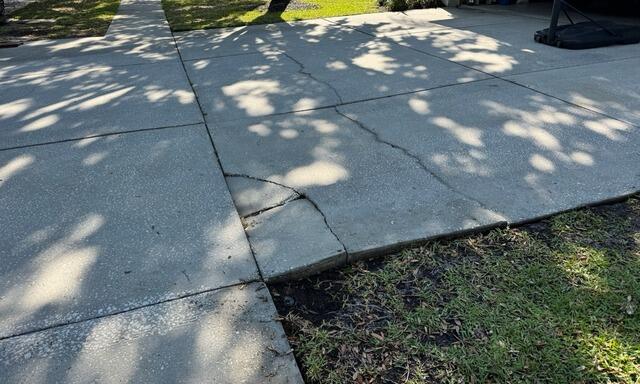 Concrete Driveway Settlement Damage