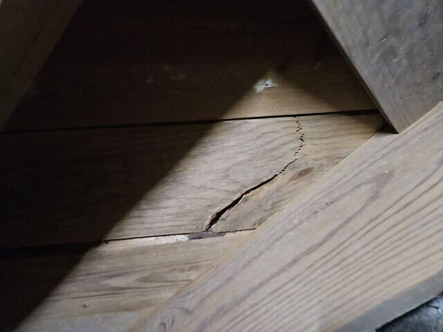 Broken Crawl Space Wood