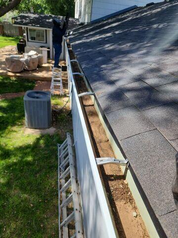 Cleaning out the gutters.
