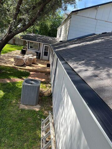 Newly installed gutter guard system.
