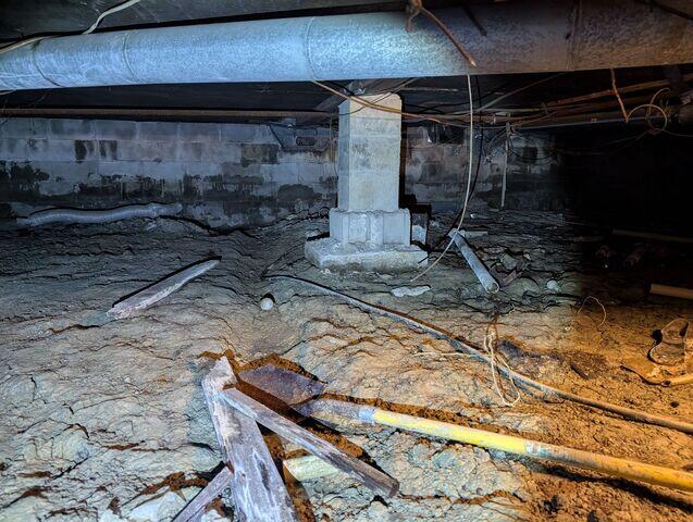 Damp and Dark Crawl Space