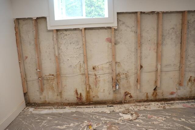 Removing Everything to Get Drainage Installed.