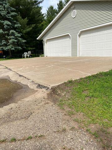 Lifted and Sealed Driveway After DBS Repair
