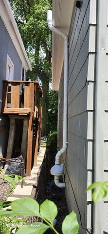 Radon fan and exhaust riser