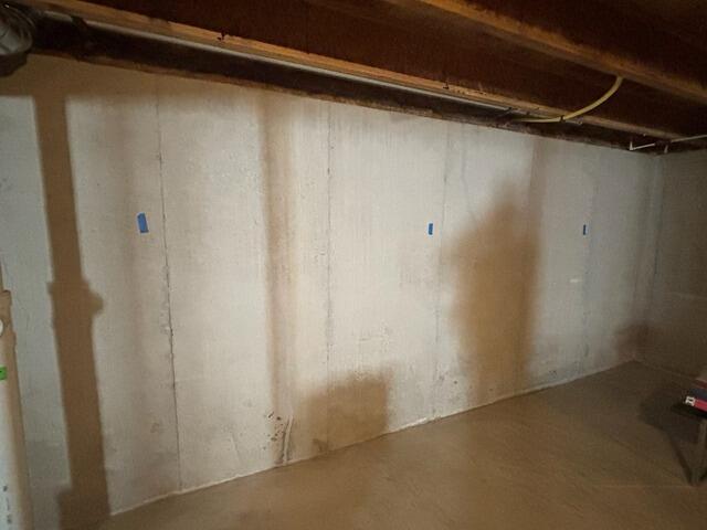 Humid and Bowing Basement Wall