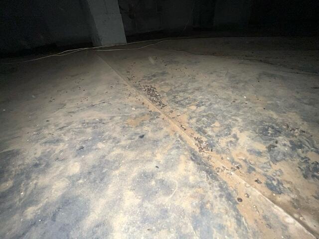Debris Ruining Vapor Barrier.