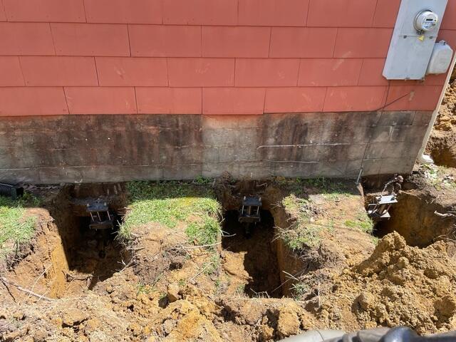 Multiple piers installed along foundation