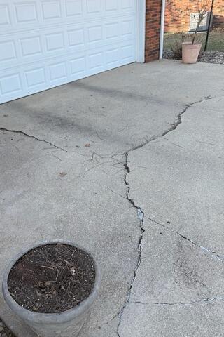Unleveled and Cracked Driveway