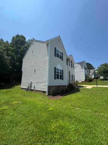 Side of home after gutter installation