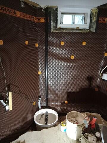 Sump pump and wall membrane
