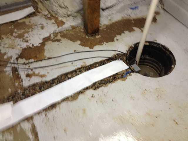 Cross Tile Installation Aids Drainage to Sump Pump