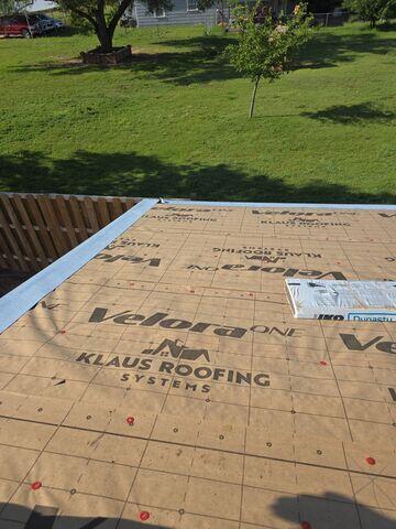 Velora One and Klaus Roofing System being installed.