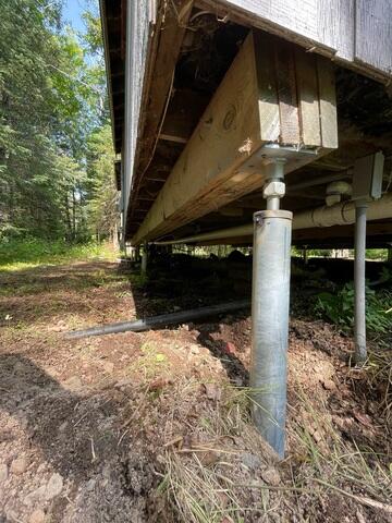 Close-Up of Helical Pier Installation