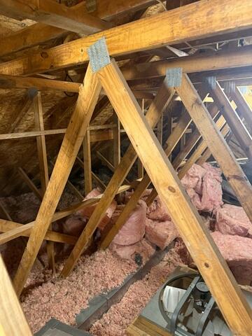 Unorganized Attic Insulation