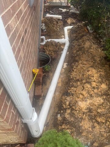Downspout Extension and Drain Line Installation to Protect Foundation - Winston-Salem, NC