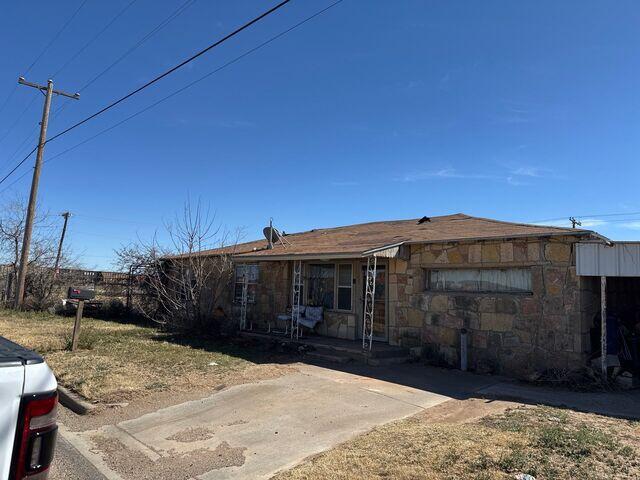 Home with a damaged Roof.