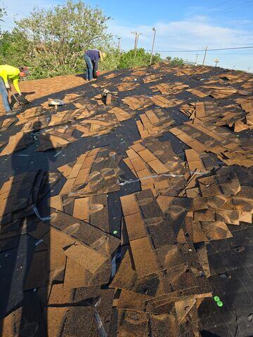 Crew Removing all the old shingles.
