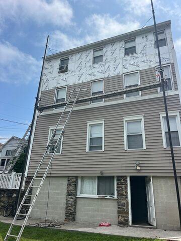 Siding installation is near completion