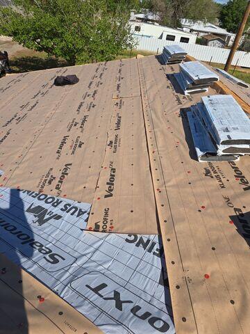 Installaion of Synthetic underlayment and Ice and Water Shield.