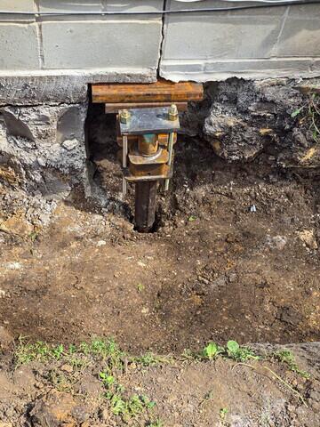 During Helical Pier Installation