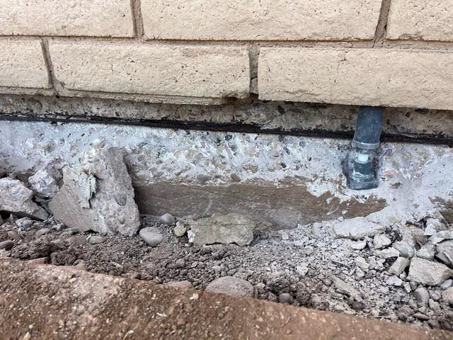 Stem Wall Repair in Progress - Rebar Removed & Support Jack in Place | Mesa, AZ