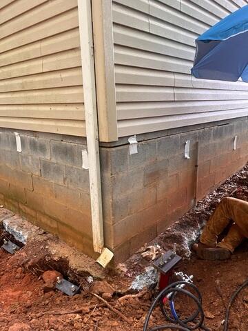 Foundation Piers Installed to Stabilize Settling Structure