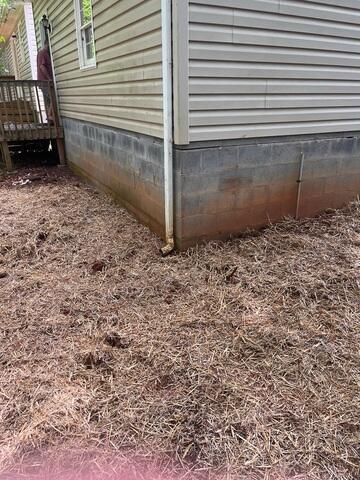 Restored Exterior with Stabilized Foundation and Finished Yard