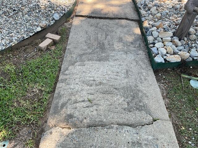 Sidewalk Cracked and Sinking