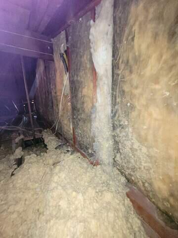 Attic adjacent wall