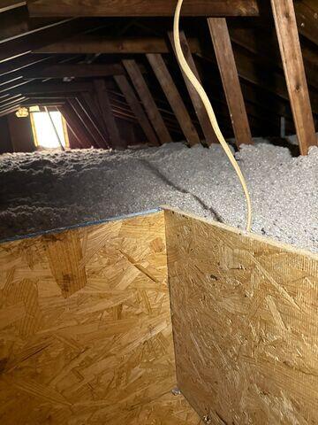 Storage deck and cellulose insulation