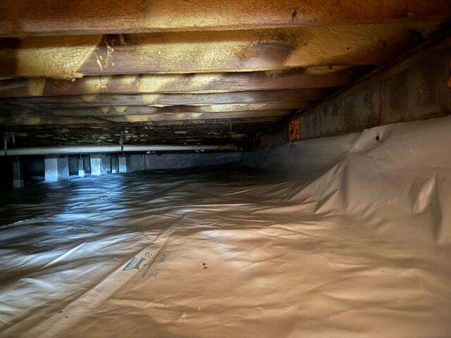 Sealing Crawl Space with CleanSpace Moisture Barrier