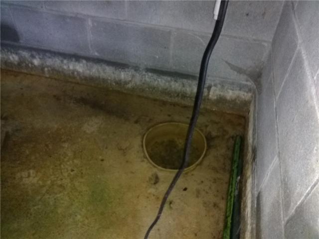 Old Sump Pump in Adelphia, NJ