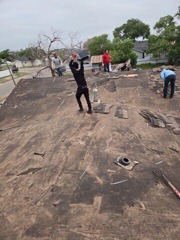 Removing old shingles.