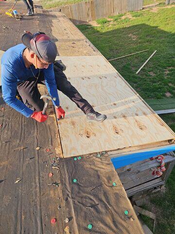 Repairing the decking.