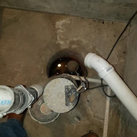 Outdated Basement Waterproofing System Before Upgrade
