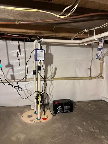 New Poured Slab, TripleSafe Sump Pump, and CleanSpace Wall System