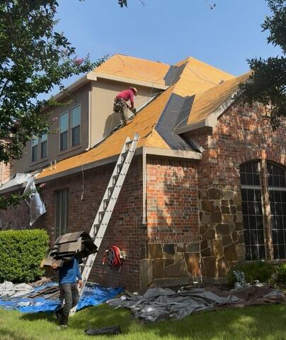 Old shingles removed, re-nailing in progress