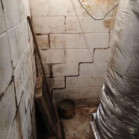 Before - Severe Cracking and Water Intrusion