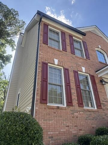 Installed 2-story gutter downspouts around the home's exterior
