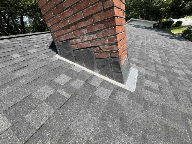After Roof Replacement and New Chimney Flashing