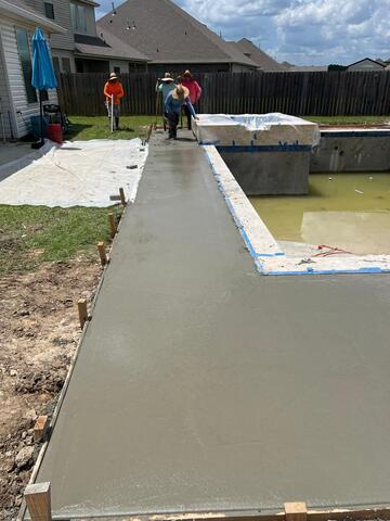 Smoothing out Freshly Poured Pool Deck!