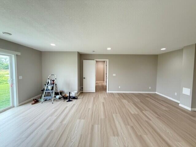Finished family room leading into hallway